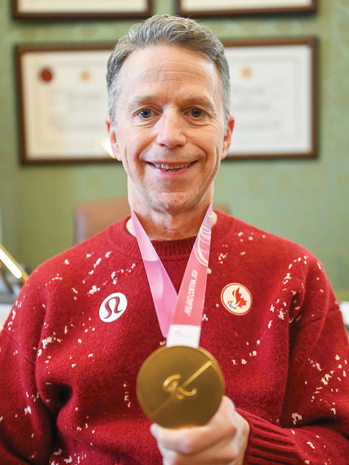 Gil Dash with his gold medal.