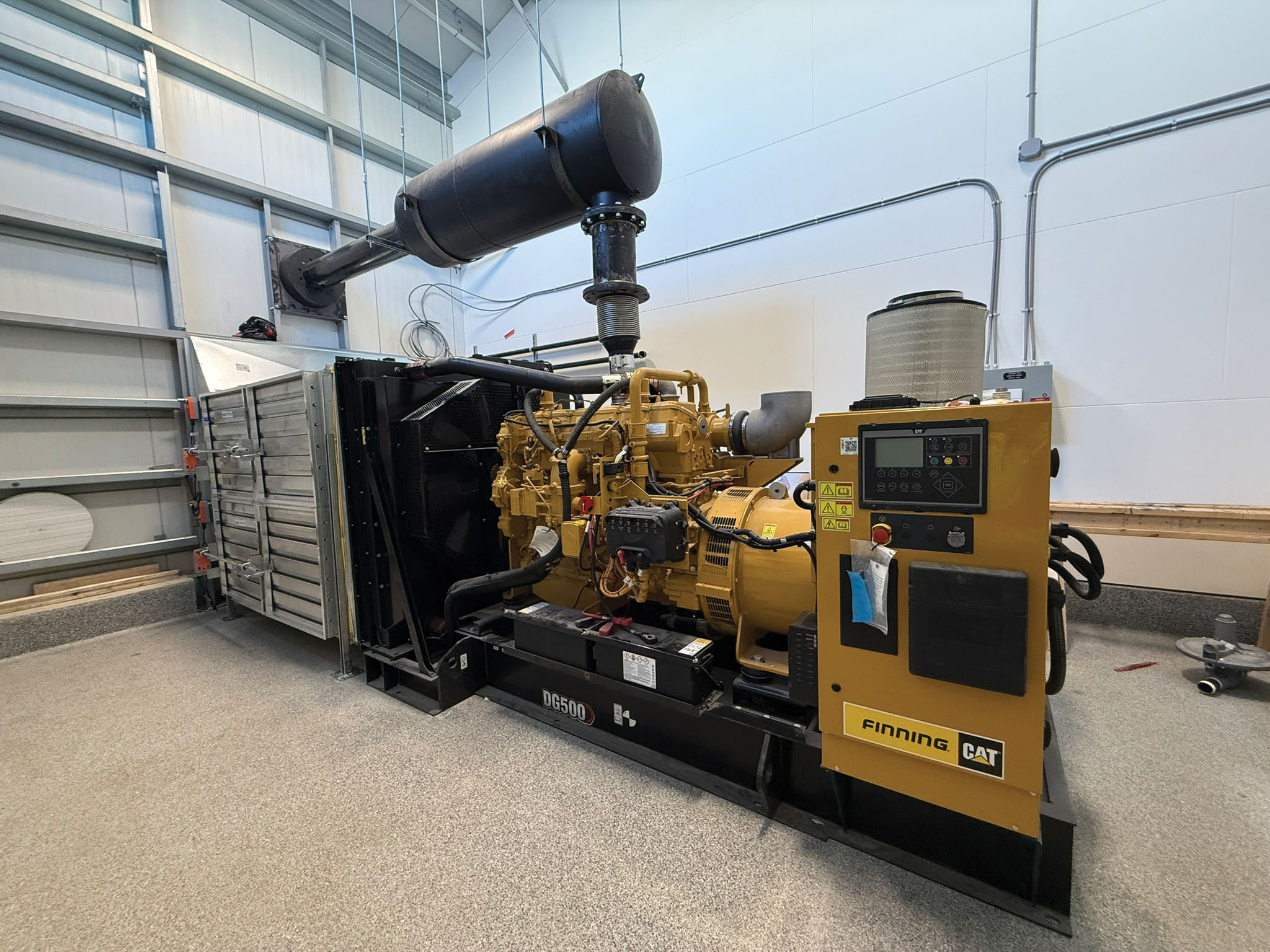 The generator room. A 500 kW standby generator is housed within the water treatment plant to provide standby power to the facility during power outages. This equipment ensures minimal disruptions to user’s access to drinking water during power outages.