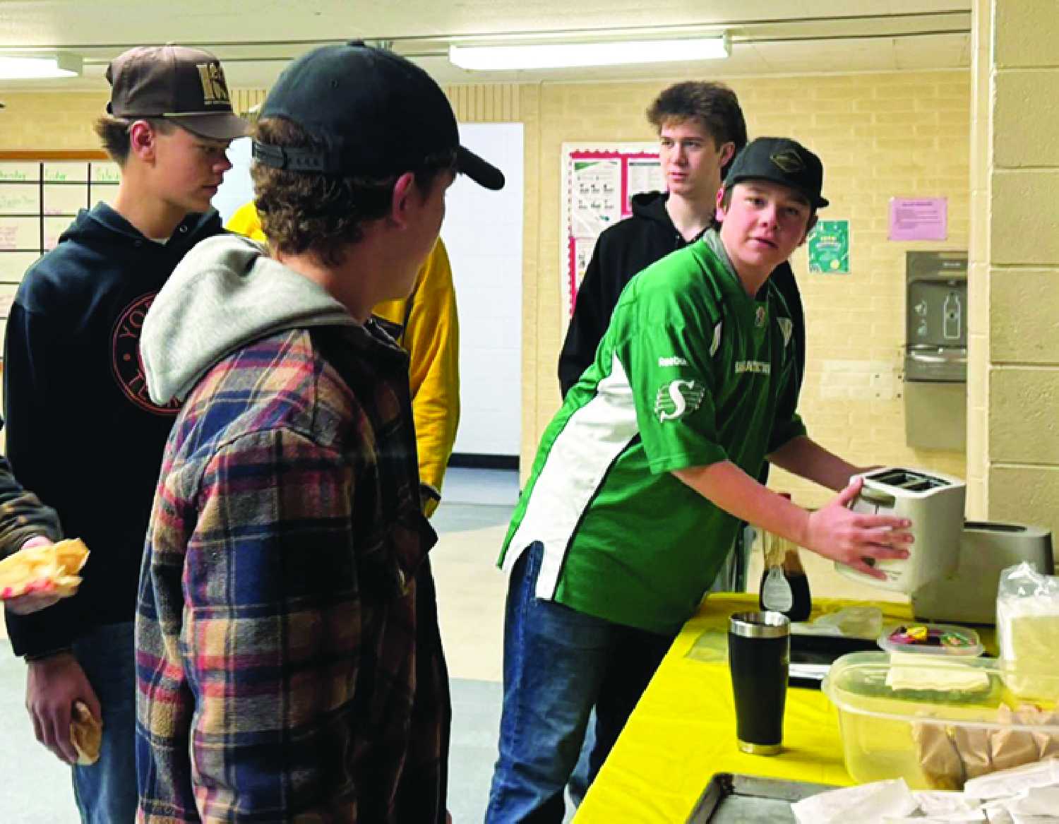 Students helping with the Esterhazy High School breakfast program.